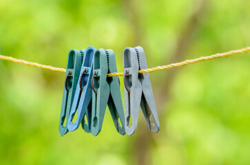 old clothespins on a rope