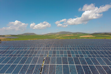 Rows of solar panels in Greece. Springtime.