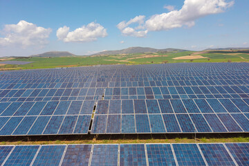 Rows of solar panels in Greece. Springtime.