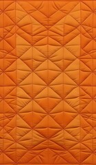 A quilt background with the color orange as its inspiration.  AI Generated