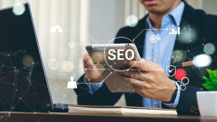 Businessman using a computer for analysis SEO Search Engine Optimization Marketing Ranking Traffic...