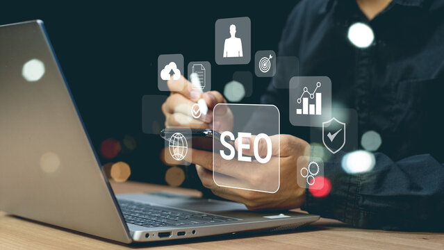 Businessman using a computer for analysis SEO Search Engine Optimization Marketing Ranking Traffic Website Internet Business Technology Concept.