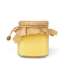 Glass jar of honey on a white background.