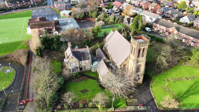 Aerial shot of the Sacred Heart Roman Catholic Church in Lancashire, England, UK