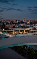 The image offers a stunning evening perspective from Vyšehrad, showcasing the panoramic beauty of...