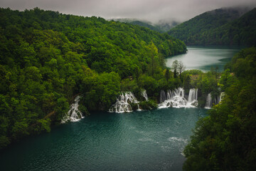 Lakes and waterfalls in the misty forest, Plitvice lakes, Croatia - 790850743