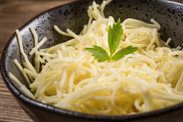 Bowl of cooked noodles.
