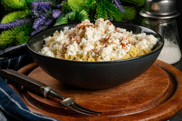 Pasta with cottage cheese, cinnamon and sugar.