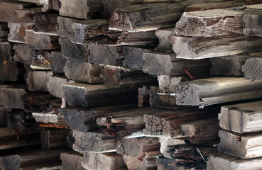 Stack of old weathered construction wood