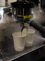 restaurant coffee maker making espresso coffees