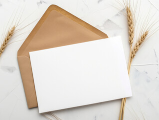 Présentation soignée d'un carton d'invitation blanc sur fond blanc-gris, mockup professionnel avec une esthétique simple, brins de blé pour une touche d'authencité