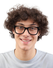 Smiling and handsome, the young man wears glasses. He looks into the camera with his blue eyes, man...