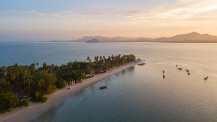 Aerial view of koh Mook with beautiful sky and sunrise, in Trang, Thailand. It is a small idyllic island in the Andaman Sea