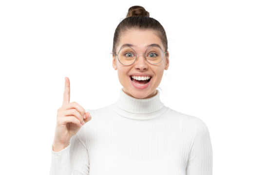 Excited smiling woman in eyeglasses pointing up with finger as if she got new idea, feeling happy about good result
