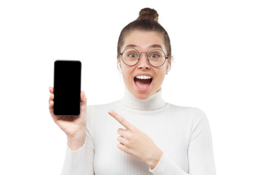 Young surprised girl feeling excited by advertisement she is showing on blank phone screen, pointing with finger