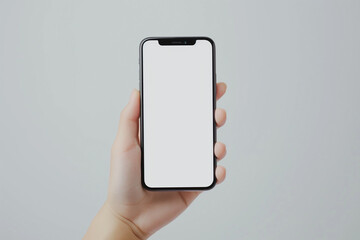 Close up person holding a phone with a mockup in hand on a simple background, a smartphone with a white screen to insert any image
