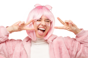 Close-up portrait of young excited funny girl dressed in winter fur coat, showing v sign and enjoying time at party