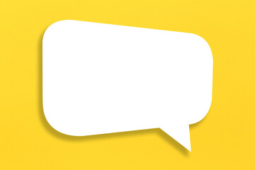 Empty white paper in speech bubble shape set against yellow background. - 790910322
