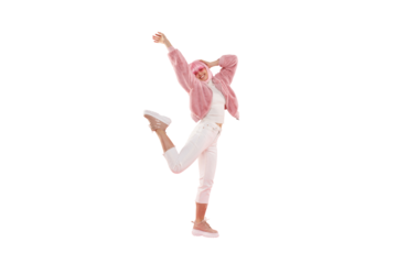 Full length portrait of young happy girl wearing funky clothes and colored wig, dancing and jumping at party