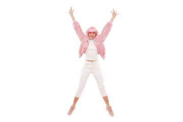 Full length portrait of young happy energetic girl wearing funky clothes, wig and colored glasses, jumping with hands lifted up