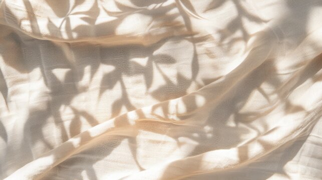 Beige linen fabric texture with folds and a natural floral sunlight shadows, aesthetic summer wedding bohemian background