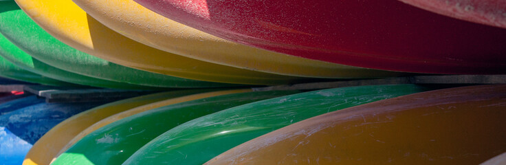 Fragment of a plastic catamaran for recreation on the water, close-up. Catamarans in storage out of...