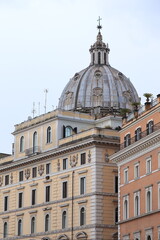 Corso Vittorio Emanuele Street View with Building Facades and Sant'Andrea della Valle Church Dome in Rome, Italy