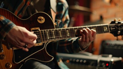Obraz premium Repetition of rock music band. Cropped image of electric guitar player. Rehearsal base.