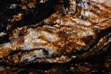 Exquisite Black Magma granite texture in dark tone.