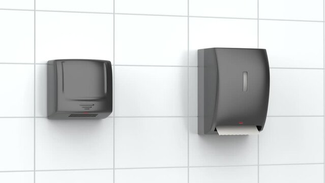 Black automatic paper towel dispenser and electric hand dryer in public toilet