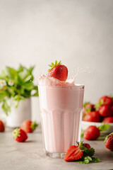 Glass of fresh strawberry milkshake
