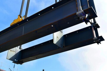 Steel beams being hoisted into place with precision, abstract  , background - obrazy, fototapety, plakaty