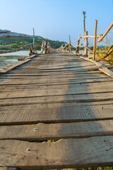 Fototapeta premium View of Ong Cop bridge or Tiger wooden bridge, Vietnam's longest wooden bridge in Chi Thanh district, Phu Yen province, Vietnam