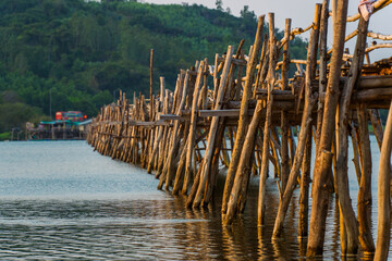 View of Ong Cop bridge or Tiger wooden bridge, Vietnam's longest wooden bridge in Chi Thanh...