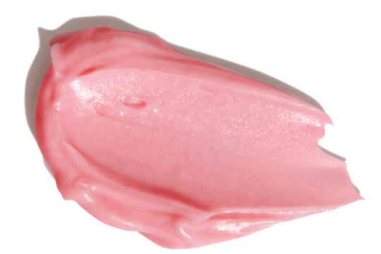 Pink smear of cream on empty background