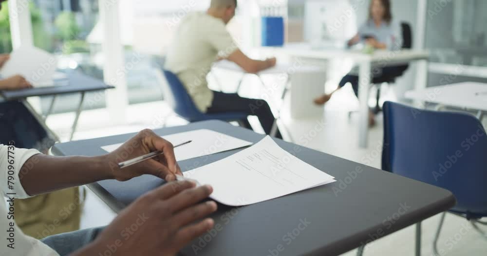 Poster black man, hands and writing exam in classroom with paperwork, documents or test at school. closeup 
