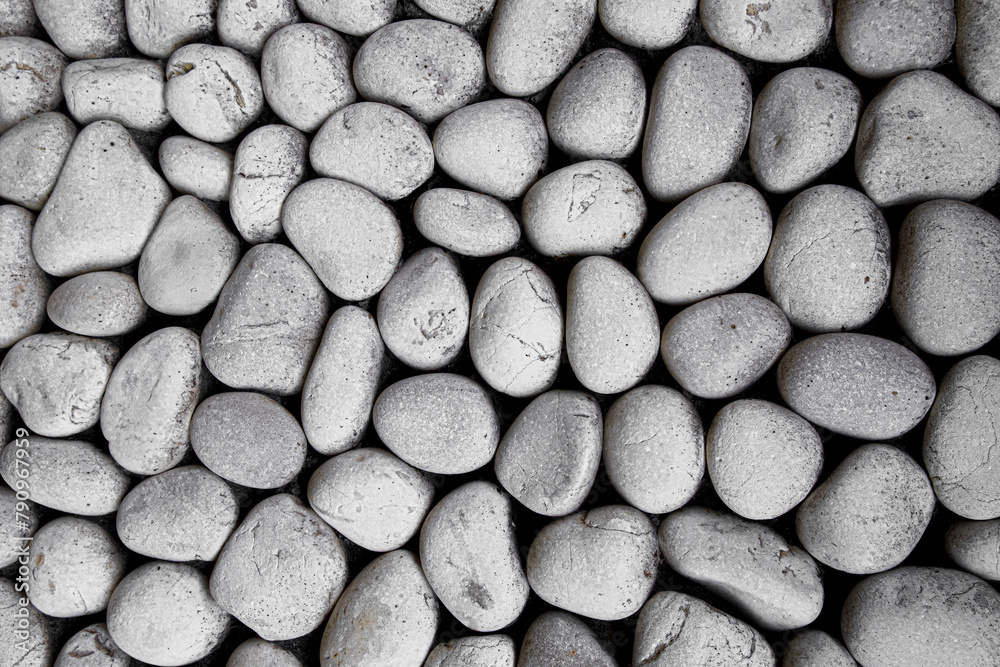 Wall mural Pile of stones in black dirt texture