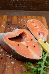 Salmon slices on wood, perfect for a delicious seafood dish