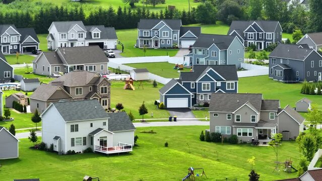 Housing market in the USA. Residential homes in suburban sprawl development in Rochester, New York. Low-density two story private houses in rural suburbs
