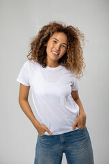 T-shirt design and advertising concept. Style and fashion. Indoor shot of cheerful smiling young...