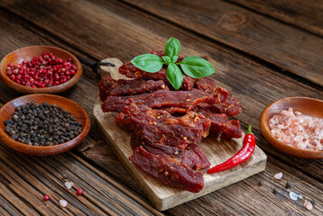 Dry beef meat jerky biltong with hot pepper chilli and spices