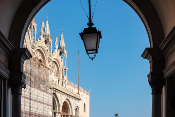 Scenic view through an arch window on St Mark's Basilica in city Venice, Veneto, Northern Italy,...