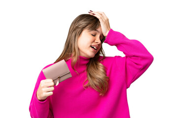 Young girl holding a wallet over isolated chroma key background has realized something and...