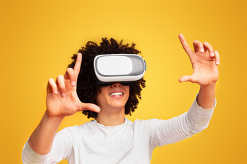 Young african-american man wearing virtual reality headset