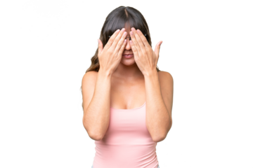 Young caucasian woman over isolated background covering eyes by hands