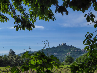 Obraz premium Scenic view of a castle on the hill in Park of Montevecchia and Valle del Curone, Lecco, Lombardy, Italy, Europe. SANTUARIO DI MONTEVECCHIA in Northern Italy. Agritourism in tranquil atmopshere