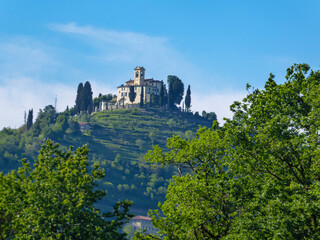 Scenic view of a castle on the hill in Park of Montevecchia and Valle del Curone, Lecco, Lombardy, Italy, Europe. SANTUARIO DI MONTEVECCHIA in Northern Italy. Agritourism in tranquil atmopshere - obrazy, fototapety, plakaty