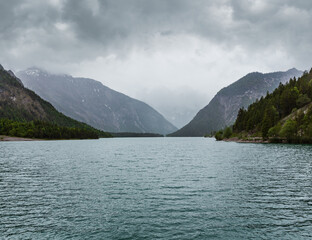 Plansee Alps mountain lake summer overcast day view, Tyrol, Austria.