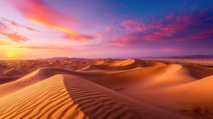 An expansive desert landscape at sunset, vivid colors in the sky, dunes creating patterns,...
