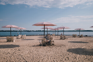 beach chairs and umbrellas on the beach
